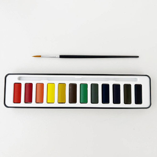 Watercolor paint set with brush